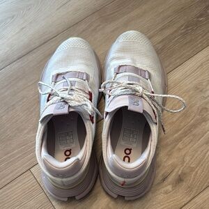 On Running White and Pink Sneakers